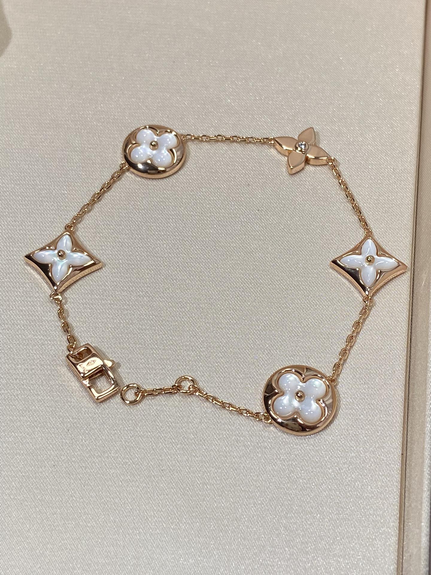 [vivabelle]STAR AND SUN 5 MOTIF MOP PINK GOLD BRACELET