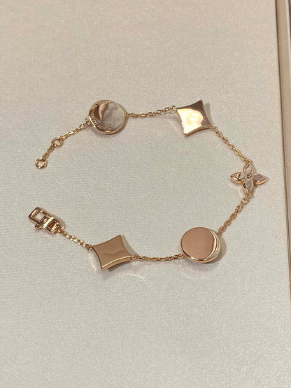 [vivabelle]STAR AND SUN 5 MOTIF MOP PINK GOLD BRACELET